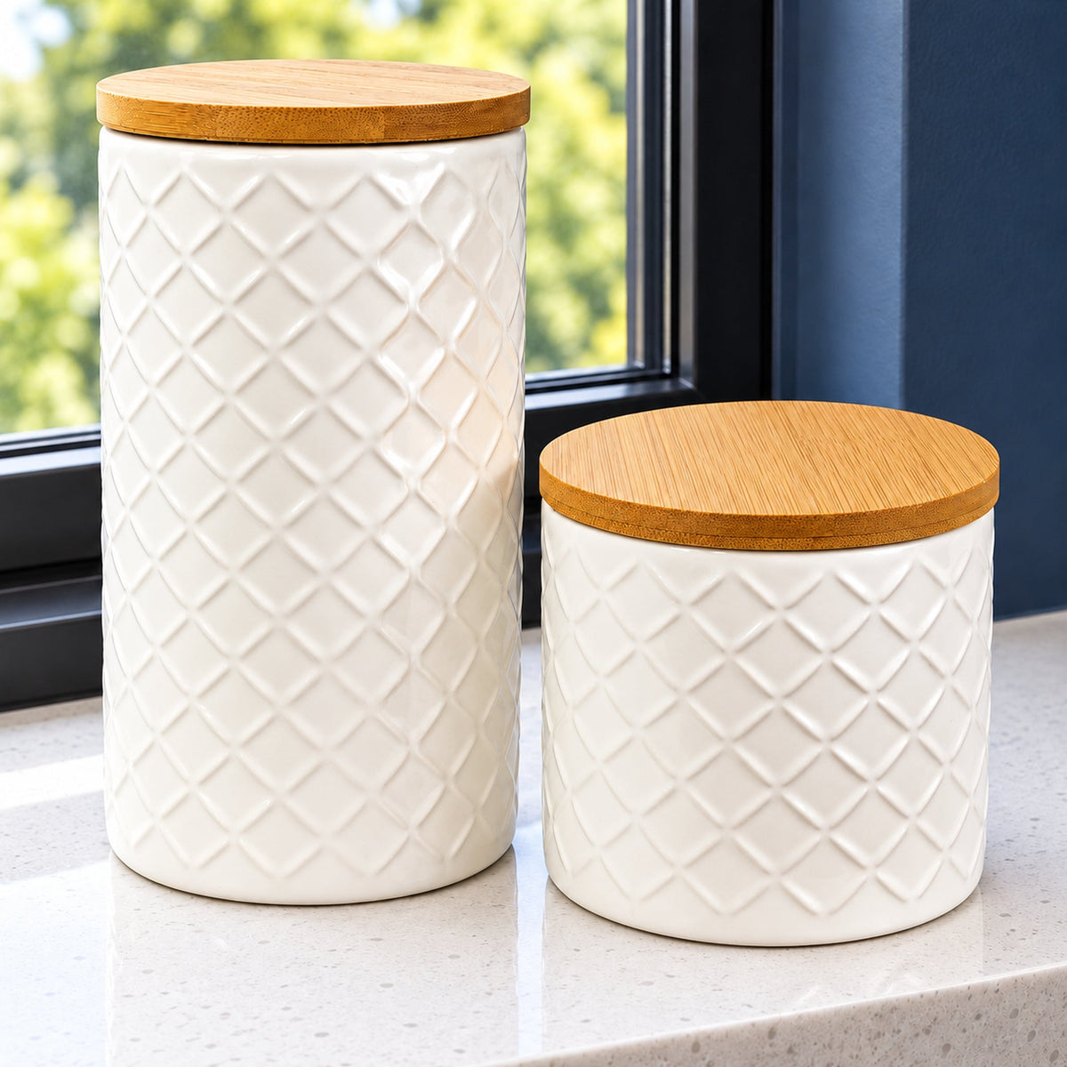 Set of Two Ceramic Jars Embossed Cream Canisters with Lids